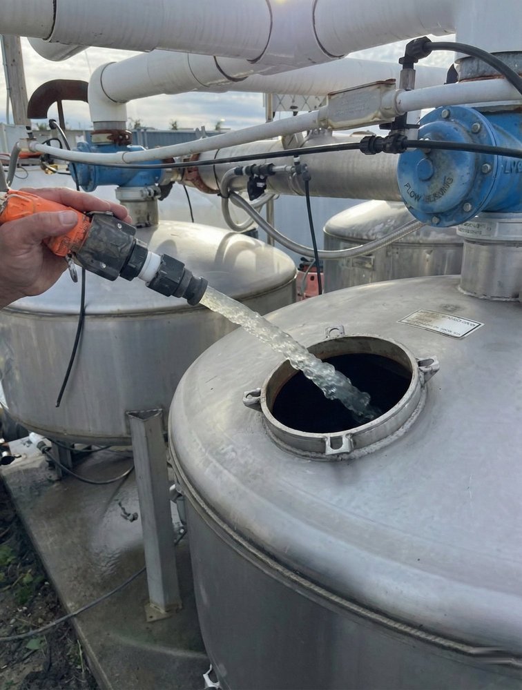 FuturFlo easy application — pouring product into filter tank